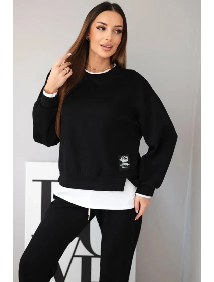 Dámský komplet s máslovou barvou, volnou mikinou a tepláky černý Dámský komplet s máslovou barvou, volnou mikinou a tepláky černý