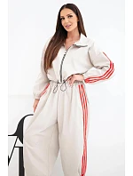 Dámská bavlněná souprava s oversized kalhotami a kontrastními lampasy béžová Dámská bavlněná souprava s oversized kalhotami a kontrastními lampasy béžová