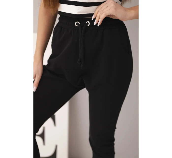 Dámské tepláky s elastickým pasem a šňůrkou černé