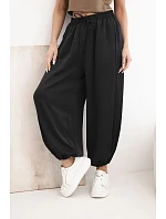 Dámské široké kalhoty s gumou v pase a vázáním ve stylu model 22064413 černé - K-Fashion