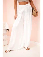 Široké dámské viskózové kalhoty s elastickým pasem bílé Široké dámské viskózové kalhoty s elastickým pasem bílé