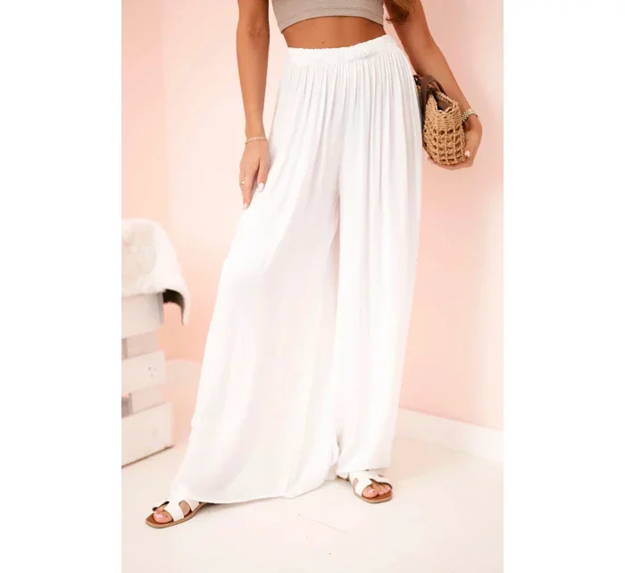 Široké dámské viskózové kalhoty s elastickým pasem bílé Široké dámské viskózové kalhoty s elastickým pasem bílé