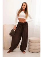 Dámské viskózové kalhoty s širokými nohavicemi a volánky hnědý