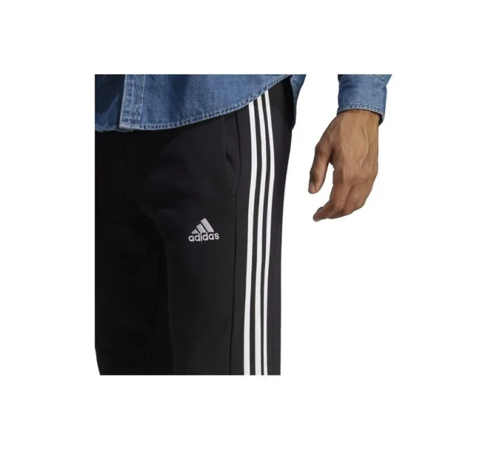 Kalhoty adidas Essentials French Terry Tapered Cuff 3-Stripes M HA4337 Kalhoty adidas Essentials French Terry Tapered Cuff 3-Stripes M HA4337