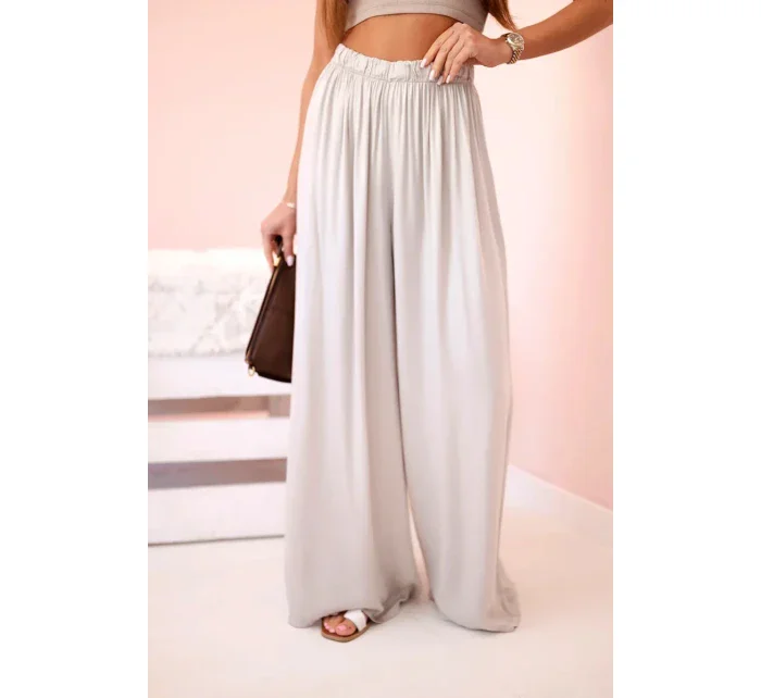 Široké dámské kalhoty s elastickým pasem tmavě béžová