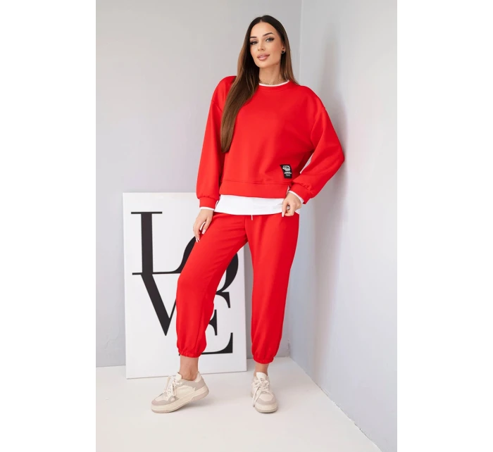 Dámský komplet s s volnou mikinou a tepláky červený model 21808643 - K-Fashion Dámský komplet s s volnou mikinou a tepláky červený model 21808643 - K-Fashion