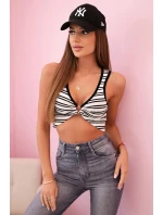 Top dámský pruhovaný s ozdobným zlatým detailem a hlubokým výstřihem černá Top dámský pruhovaný s ozdobným zlatým detailem a hlubokým výstřihem černá