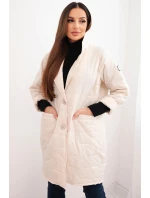 Dámská bunda Plus Size prošívaná s ozdobnými knoflíky a límcem model 21789296 béžová - K-Fashion