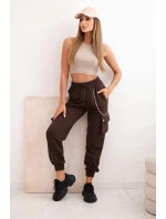 Dámské bavlněné cargo kalhoty s kapsami a řetízkem hnědé Dámské bavlněné cargo kalhoty s kapsami a řetízkem hnědé