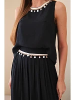 Dámský komplet z viskózy s topem bez rukávů a širokými kalhotami s ozdobným zakončením černý Dámský komplet z viskózy s topem bez rukávů a širokými kalhotami s ozdobným zakončením černý