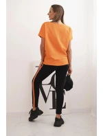 Dámský bavlněný komplet s tričkem a legínami s lampasem oranžový Dámský bavlněný komplet s tričkem a legínami s lampasem oranžový