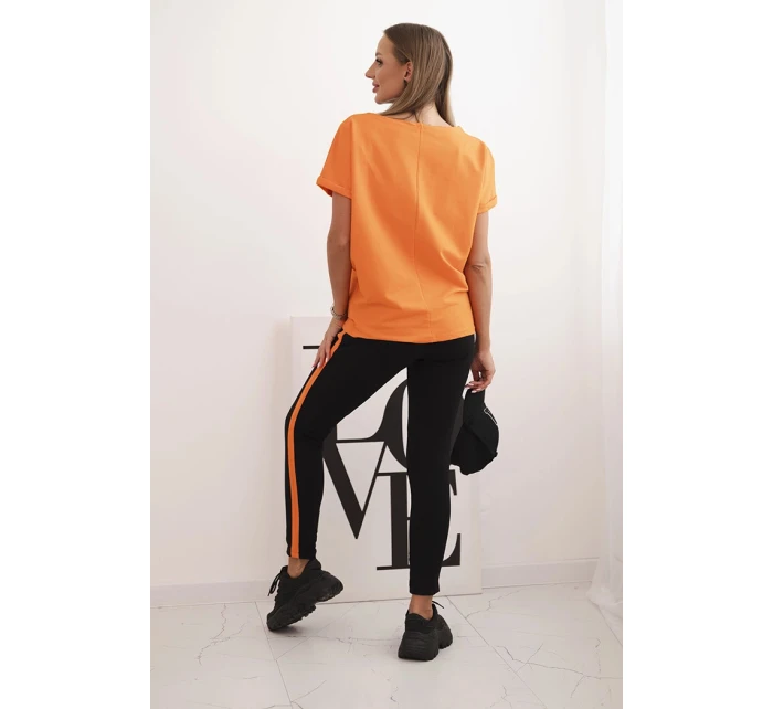 Dámský bavlněný komplet s tričkem a legínami s lampasem oranžový Dámský bavlněný komplet s tričkem a legínami s lampasem oranžový