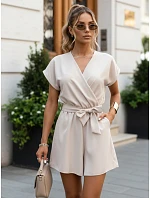 Kombinezon damski z dekoltem beżowy model 22198773 - FashionStreet Kombinezon damski z dekoltem beżowy model 22198773 - FashionStreet