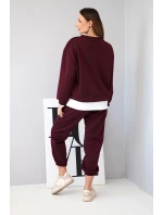 Dámská souprava s model 21808623 volnou mikinou a tepláky švestková - K-Fashion Dámská souprava s model 21808623 volnou mikinou a tepláky švestková - K-Fashion