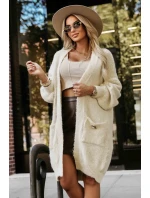 Módní oversize svetr s ozdobnou broží a kapsami béžový model 21322456 - numoco basic