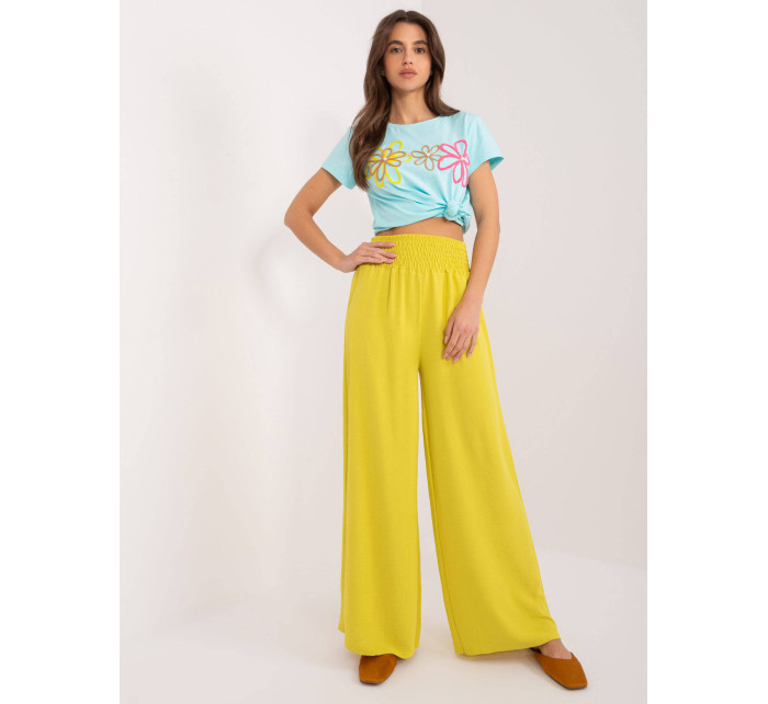 Žluté široké dámské kalhoty s gumou v pase (8390)