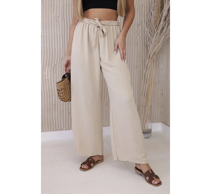 Kalhoty s širokým pasem beżowy
