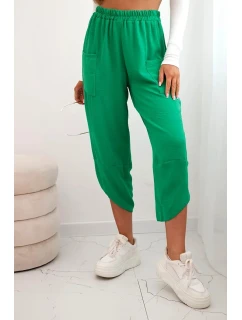 Kalhoty se širokými nohavicemi a kapsami zelený