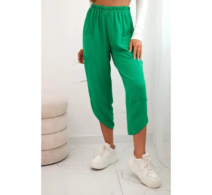 Kalhoty se širokými nohavicemi a kapsami zelený Kalhoty se širokými nohavicemi a kapsami zelený