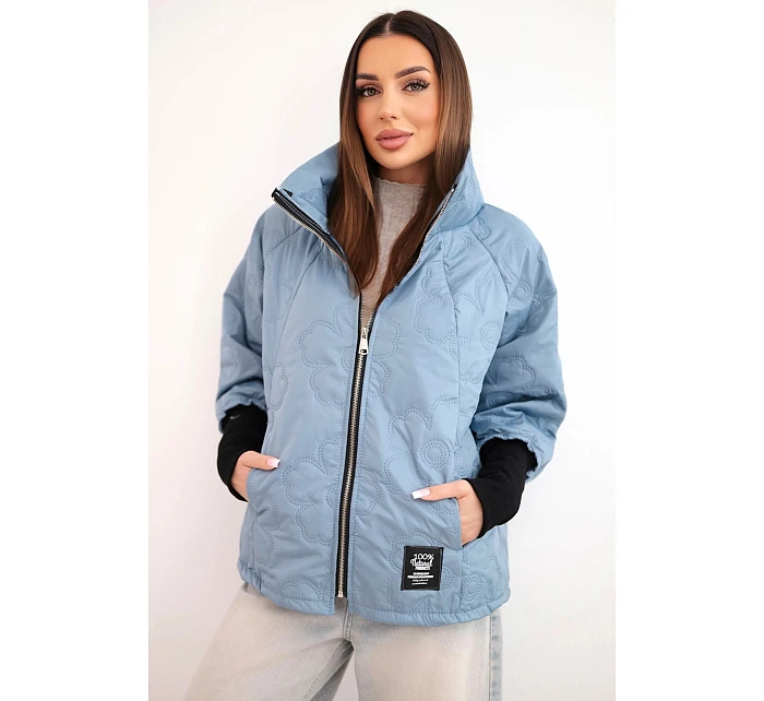 Dámská jarní prošívaná bunda s ozdobnou ražbou a zipem jeansová