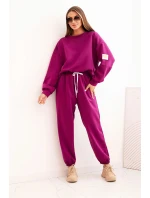 Dámská souprava máslová s volnou mikinou a kalhotami s nápisem LOVE tmavě fialová Dámská souprava máslová s volnou mikinou a kalhotami s nápisem LOVE tmavě fialová