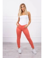 Tmavě meruňkové džínové kalhoty