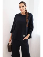 Dámská tepláková souprava z materiálu se širokými nohavicemi model 21489458 - K-Fashion Dámská tepláková souprava z materiálu se širokými nohavicemi model 21489458 - K-Fashion