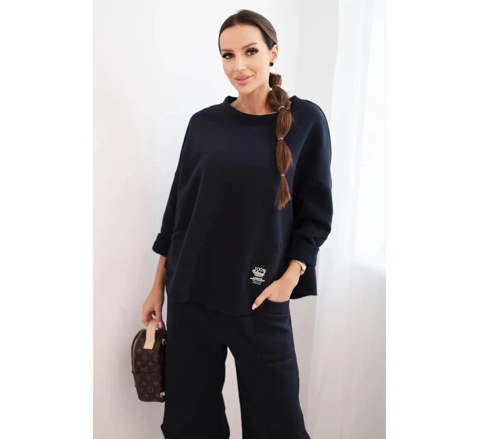 Dámská tepláková souprava z materiálu se širokými nohavicemi model 21489458 - K-Fashion Dámská tepláková souprava z materiálu se širokými nohavicemi model 21489458 - K-Fashion