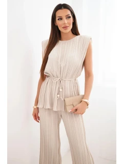 Dámský viskózový plisovaný komplet s vázanou halenkou a širokými kalhotami béžový