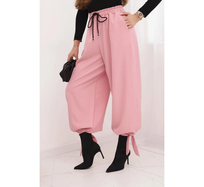 Dámské kalhoty s širokým nohavicí a vázáním dole světle růžové Dámské kalhoty s širokým nohavicí a vázáním dole světle růžové