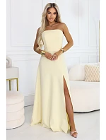 maxi šaty s rozparkem a zavazováním na zádech žluté model 22064816 - numoco maxi šaty s rozparkem a zavazováním na zádech žluté model 22064816 - numoco