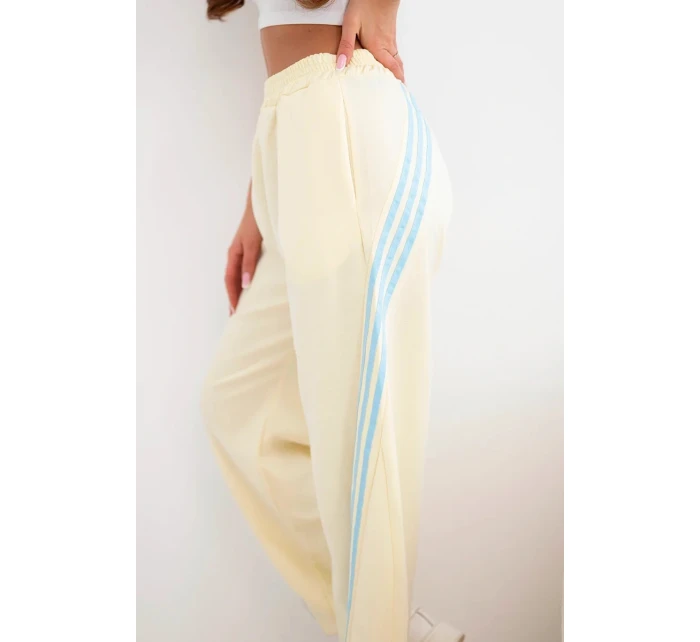 Dámské máslové kalhoty z viskózy s lampasem žluté