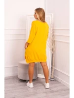 Šaty s potiskem a rozšířeným spodním dílem v hořčicové barvě Šaty s potiskem a rozšířeným spodním dílem v hořčicové barvě
