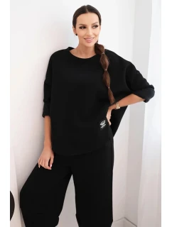 Dámský teplákový komplet z silnějšího materiálu se širokými nohavicemi černý