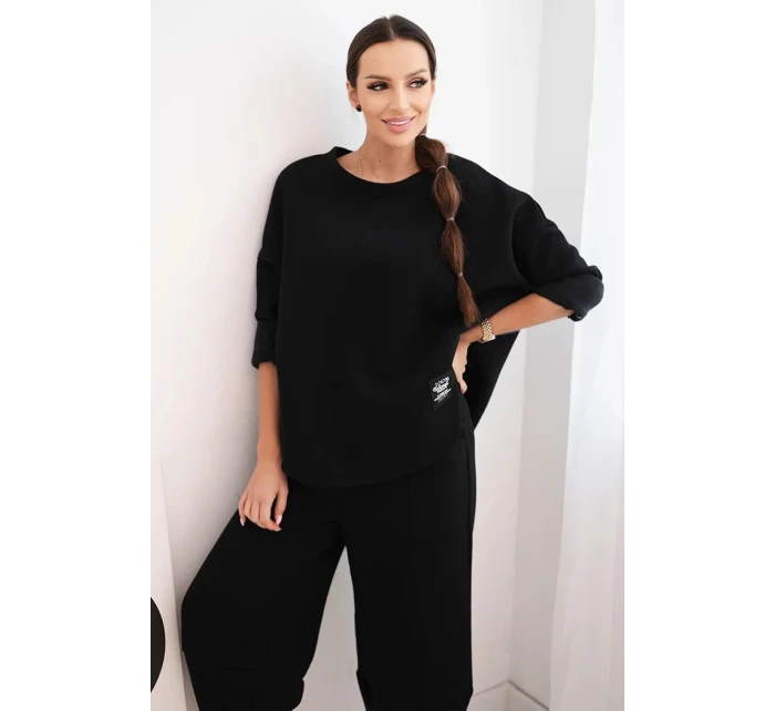 Dámský teplákový komplet z silnějšího materiálu se širokými nohavicemi černý Dámský teplákový komplet z silnějšího materiálu se širokými nohavicemi černý
