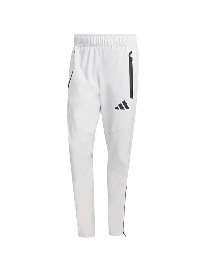 Pánské kalhoty Tiro 26 Travel Woven světle šedé model 22062493 - ADIDAS