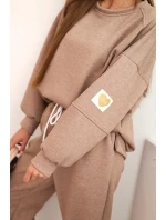 Komplet dámský máslový s volnou mikinou a kalhotami s nápisem LOVE khaki Komplet dámský máslový s volnou mikinou a kalhotami s nápisem LOVE khaki