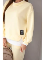 Dámská souprava s máslovou barvou, volná mikina a tepláky žlutý Dámská souprava s máslovou barvou, volná mikina a tepláky žlutý