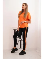 Dámský bavlněný komplet s tričkem a legínami s lampasem oranžový Dámský bavlněný komplet s tričkem a legínami s lampasem oranžový