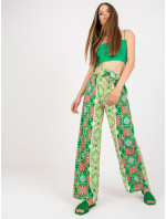 Zelené vzorované látkové kalhoty se širokou nohavicí
