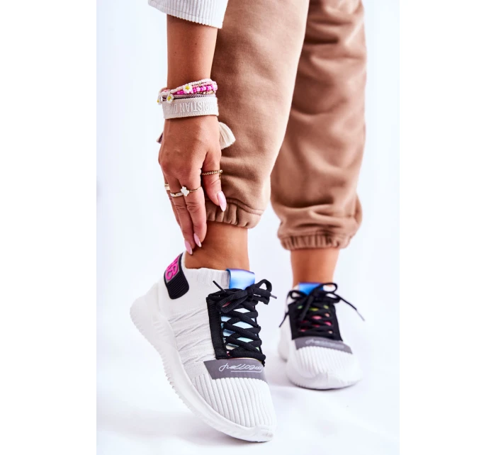 Dámská sportovní obuv nazouvací Bíle model 21591025 - Boto Dámská sportovní obuv nazouvací Bíle model 21591025 - Boto