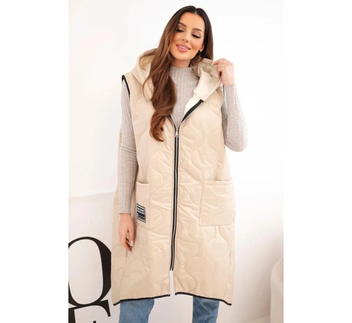 Dámská prošívaná vesta s kapucí na zip pro model 22030096 tmavě béžová - K-Fashion