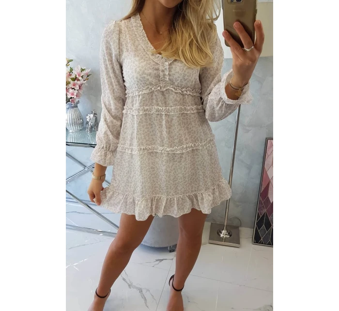 Šaty s ozdobnými volánky béžové