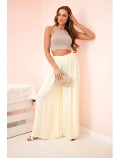 Široké dámské kalhoty s elastickým pasem žlutý