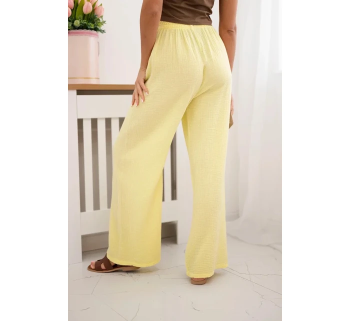 Mušelínové kalhoty se širokou nohavicí  žlutý