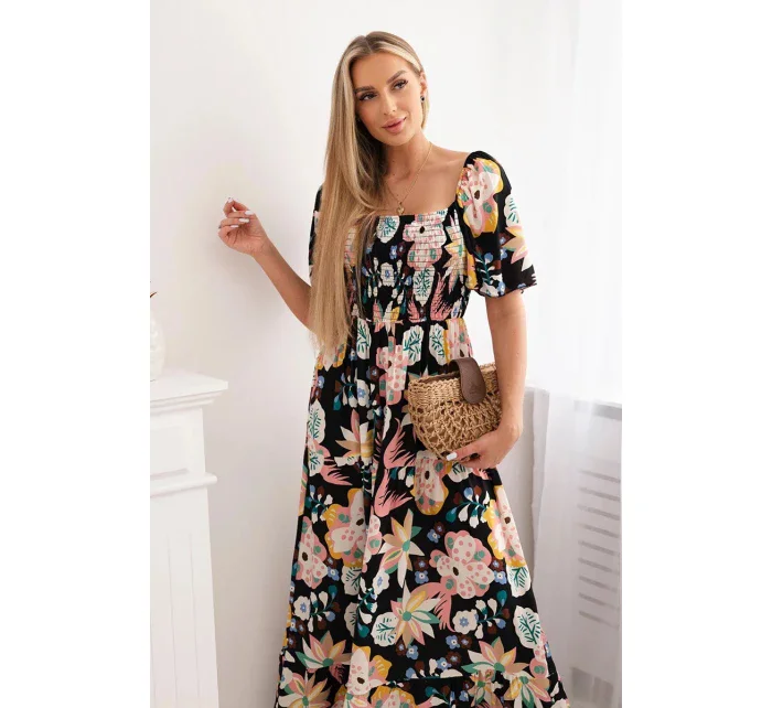 Viskózové šaty s volánkovým výstřihem model 20243124 černé - Kesi Viskózové šaty s volánkovým výstřihem model 20243124 černé - Kesi