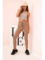 Dámské bavlněné cargo kalhoty s kapsami a řetízkem béžové