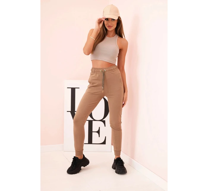 Dámské bavlněné cargo kalhoty s kapsami a řetízkem béžové