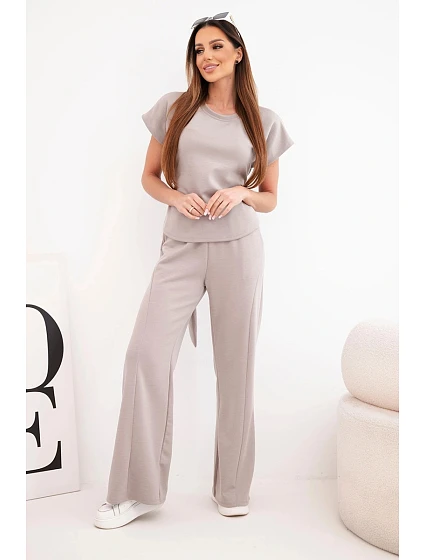 Dámský komplet z maslového materiálu s halenkou s krátkým rukávem a kalhotami se širokou nohavicí fango