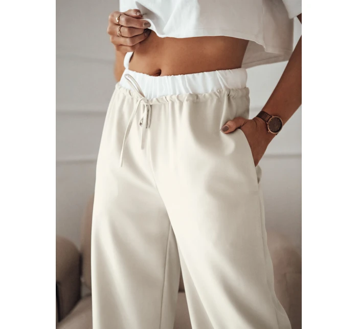 Dámské kalhoty s širokými nohavicemi béžové Dstreet model 21977031 - FashionStreet